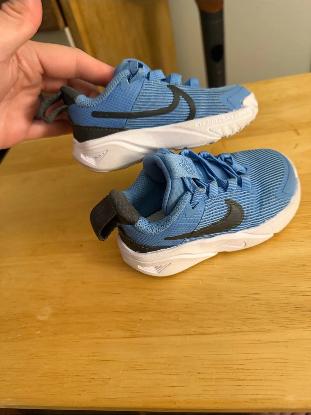 Nike Blue Kids Sneakers with Black Swoosh